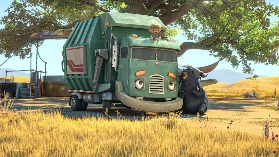 a cartoon trash truck with a small boy on top of it and a black bear leaning next to it